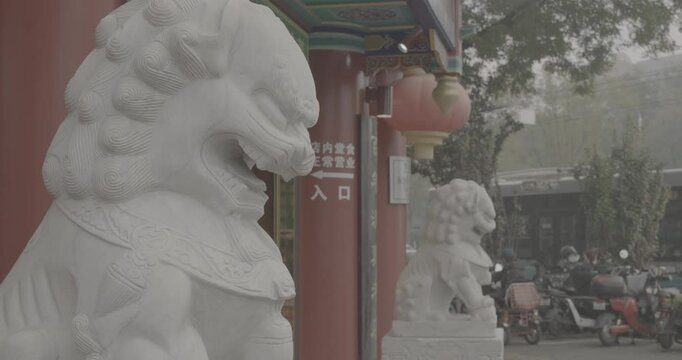 Beijing, China. Ungraded C LOG 2, Lion Dogs Or Foo Dogs, Asiatic Lions At Restaurant Entrance. Chinese Guardian Lions Or Imperial Guardian Lions Are Traditional Chinese Architectural Ornament. Stone