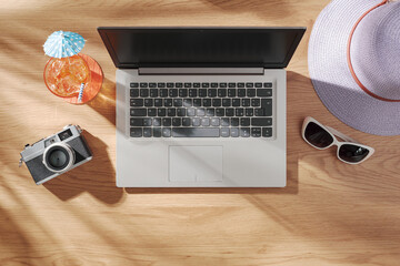 Cocktail and sunglasses on the desk: summer vacations