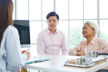 Fototapeta premium Elder woman and man have a consulting with doctor.