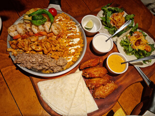 This is a Mexican food table setting.
