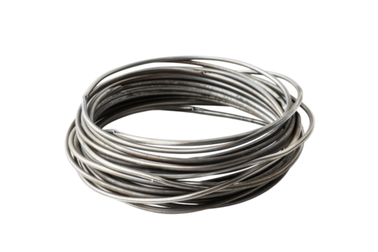 Metallic wire lies in an intricate coil, showcasing its versatility for crafting and repairs isolated on transparent background