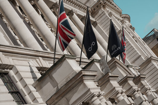 Raffles Luxury Hotel At The OWO (Old War Office) Signage, Brand Name Sign, Logo, Edwardian Baroque Facade, Whitehall, Westminster, Central London, England, United Kingdom- April 2025