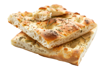 Freshly baked focaccia topped with herbs and golden crust on a white background