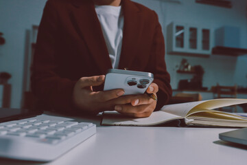 Tax deduction planning concept. Women use a calculator to calculate expenses and taxes to receive...