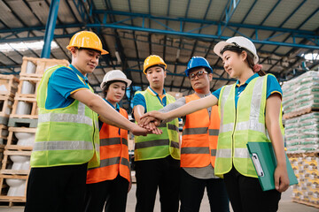 Happiness engineer and worker team group joining hands at cargo containers. .