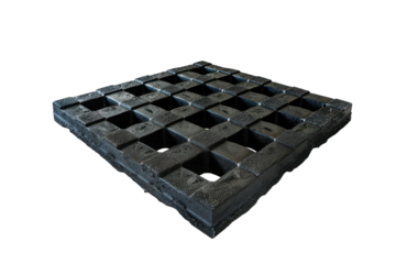 Unique textured rubber mat designed for gym surfaces in bright studio lighting