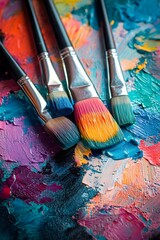 Fototapeta premium Color palettes and brushes in artist studios