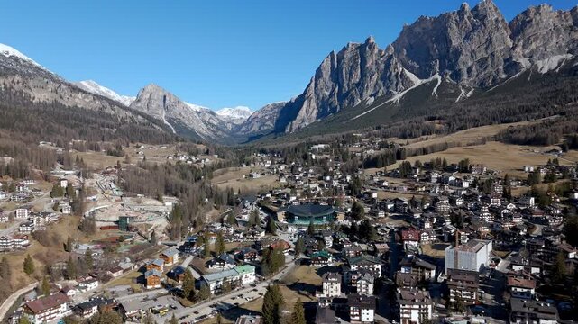 Drone fly above Italian Dolomites, Cortina d'ampezzo hosting Olympic Games winter sports stadium