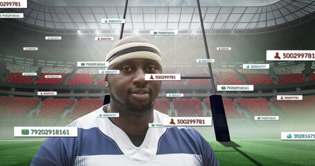 Image of media icons over african american male rugby player with ball at stadium