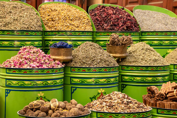 Colorful dried herbs and flowers shop in the Medina of Marrakech, Morocco