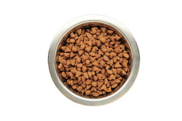 Fototapeta premium Dry dog or cat food in a bowl isolated on a white background.