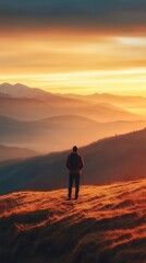 Golden Hour Solitude: A Hiker Contemplates Breathtaking Mountain Vista at Sunset