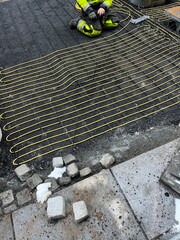 Underground Heating Cables Installation. Snowmelt System  Technology.