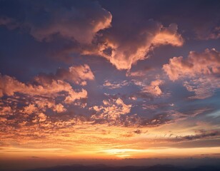 Fototapeta premium photo of beautiful sunset sky with clouds in yellow and pink tones.