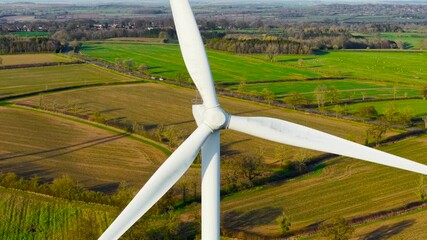 Windmill park green energy from drone view. Wind turbine moving powerful blades to deliver eco friendly power. Moving turbine blades supplying renewable electricity on wind farm