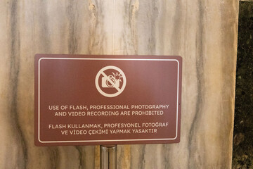 No Flash Professional Photography or Video Recording Allowed Sign