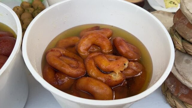 Close up shot of Khirer Jilebi, a traditional Bengali sweet dish.