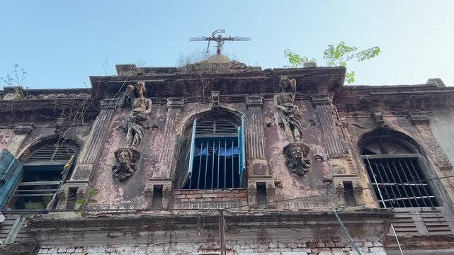 Zamindar building in north Kolkata with British era figures in the building.