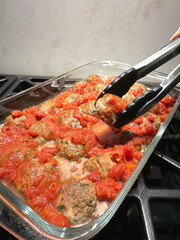 Delicious homemade meatballs in tomato sauce perfect for italian restaurants and cooking blogs - concept of comfort food