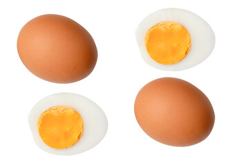Top view set of two raw brown chicken eggs and two boiled or cooked eggs in two halves with egg yolk isolated with clipping path in png file format