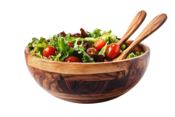 Fresh salad in rustic wooden bowl with olive wood serving spoons against a black background Vibrant greens juicy tomatoes and a on transparent background