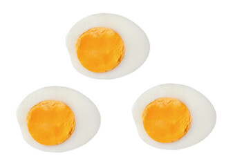 Top view set of unpeeled cooked or boiled chicken eggs in three halves with egg yolks isolated with clipping path in png file format