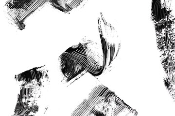 Black mascara brush strokes isolated on white.