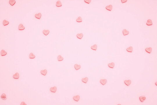 pink hearts on a pink background