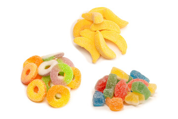 Assorted gummy candies isolated on a white background. Top view.
