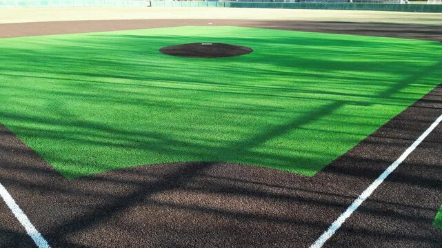 Drone moving across a new turf baseball field