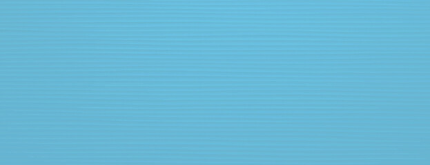 Blue background with paper textured. The background is smooth and uniform, featuring a calming blue color throughout the background. Minimal line paper texture. Simple paper background vector