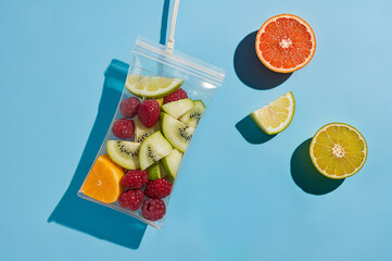 iv bottle bag of slice of kiwi apple and orange and another fruit