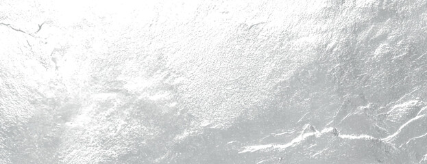 Silver metallic background with a shiny, textured surface. The background has a silver color and a reflective, smooth texture. Textured stone background vector. Silver background.