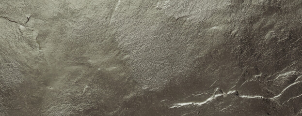 Metallic bronze background with a rough texture. The background features a bronze color with a rugged, uneven surface. Textured stone background vector. Gold background.