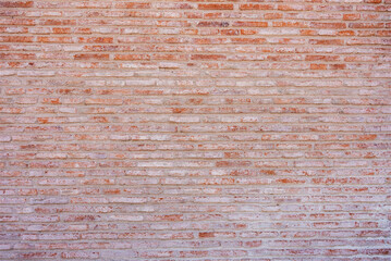 Orange color brick wall background.Stock photo