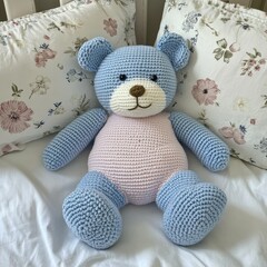Crocheted blue and pink teddy bear