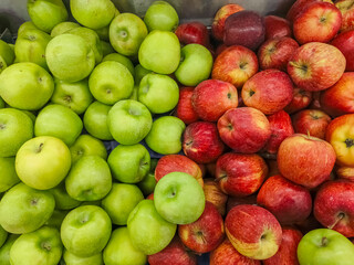 Red apple & Green apple - An apple is a round, edible fruit produced by an apple tree Malus spp. Fruit trees of the orchard or domestic apple Malus domestica, the most widely grown in the genus.	