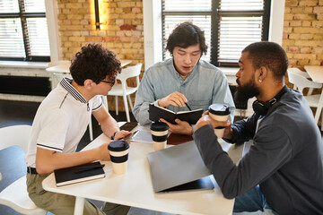 Engaging collaboration among colleagues in a modern office workspace during a brainstorming session