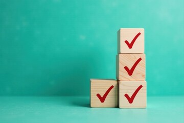 Wooden blocks with red checkmarks signifying successful task completion and goal achievement