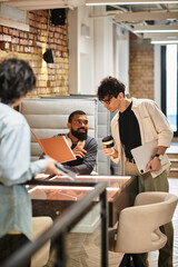 Fototapeta premium Collaboration and creativity flourish in a modern office environment during a vibrant workday