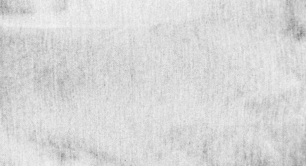 Close-up black and white fabric texture background, showing the details of the fibers with slight stains, looking old and vintage. For design, minimalism, decoration, nature, backdrop.