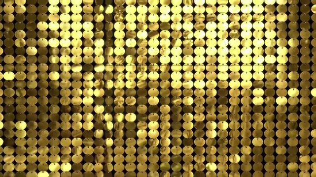 Shimmering golden sequins create dazzling decorative background.

