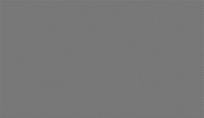 Close up view of gray synthetic fiber fabric texture forming a repeating geometric pattern, ideal for backgrounds and textures