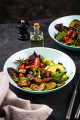 Healthy vegan keto salad with tofu and avocado