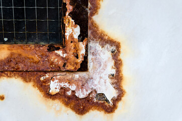 Rusty Window Frame with Corroded Edges