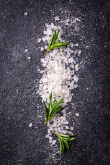 Natural sea salt crystals on dark background