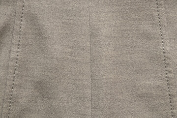Women's gray wool autumn coat as background ,fashion clothes,gray fabric