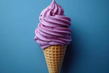 Swirls of sweet purple ice cream cone treat against blue background Summer dessert