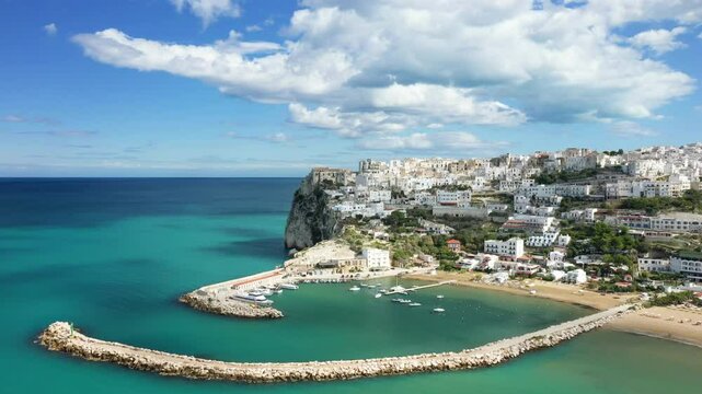 The small fishing port of Peschici in Europe, Italy, in Puglia, near Foggia, in summer, on a sunny day.&nbsp;