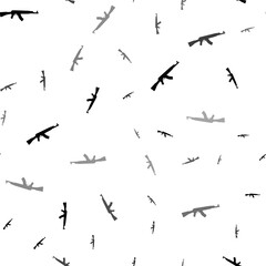 Seamless vector pattern with assault rifles, creating a creative monochrome background with rotated elements. Illustration on transparent background